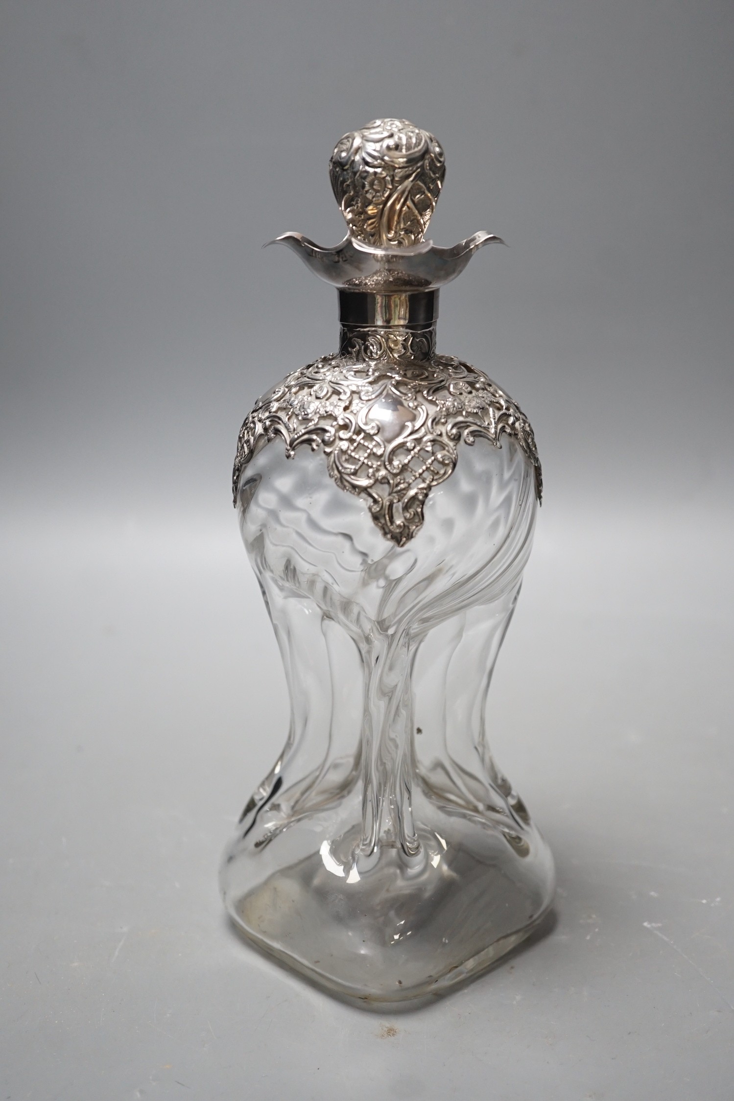 A late Victorian silver mounted waisted glass decanter and stopper, Henry Matthews, Birmingham, 1899, height 24cm.